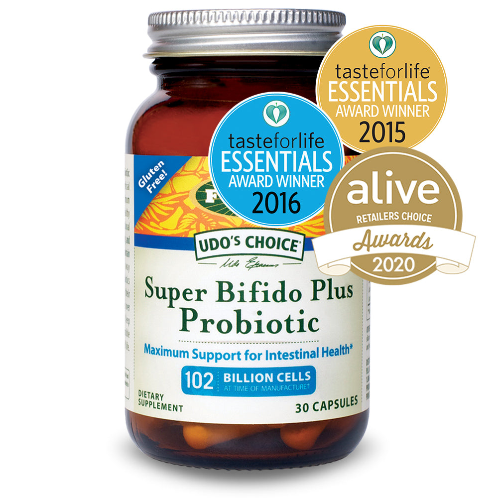 Glass bottle of Udo's Choice Super Bifido Plus Probiotic Supplement with recent awards badges